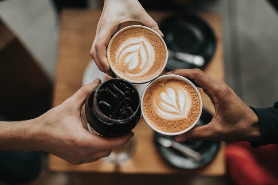 A coffee cupping table with cups and beans laid out